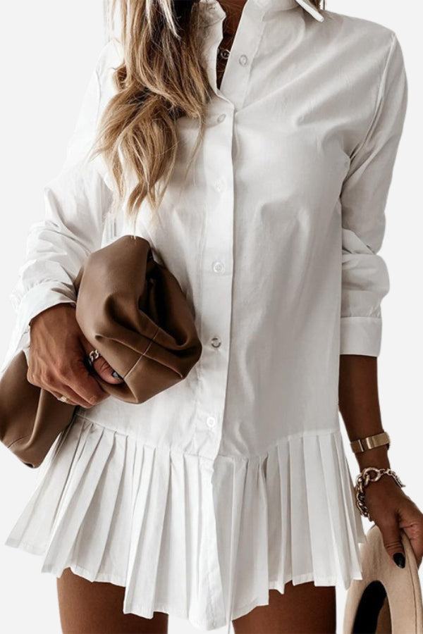 White pleated fashion plain shirt dress with long sleeves and button-down front.
