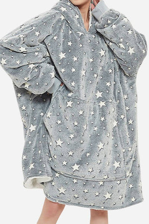 Oversized gray Lazy Fleece Blanket Sweater with white stars, hood, and front pocket, soft sherpa fleece material for warmth and comfort