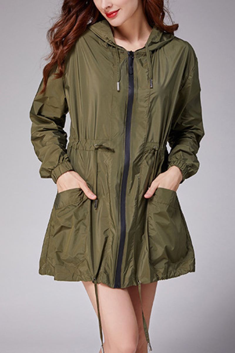 Travel ready outdoor raincoat windbreaker in olive green with hood and front pockets, lightweight and waterproof jacket with elastic waist.