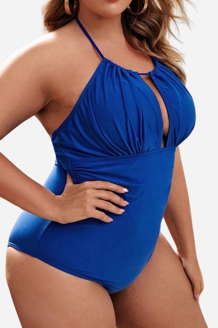 Curvy Comfort Plus Size blue one-piece swimsuit with ruched bust and supportive halter neck design