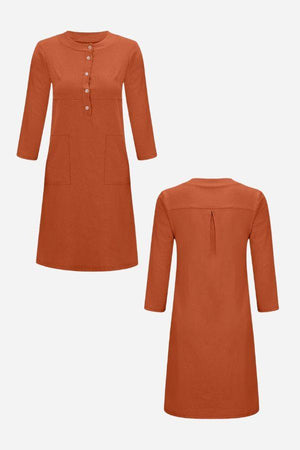 Rust-colored cotton dress with 3/4 sleeves, front buttons, and pockets, front and back views.