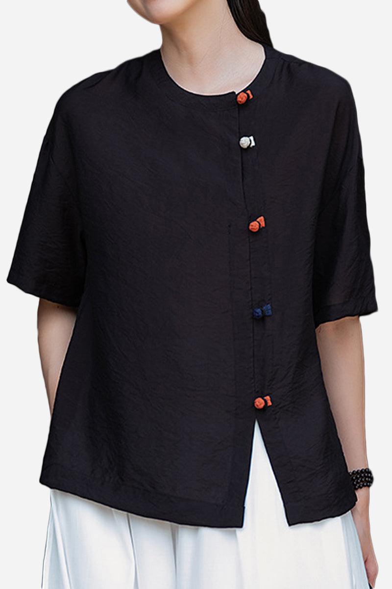 Black regenerated cellulose blouse with asymmetrical colorful buttons and oversized fit