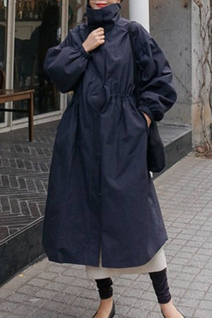 Oversized cotton stain-resistant navy coat with button front and lightweight design for travel