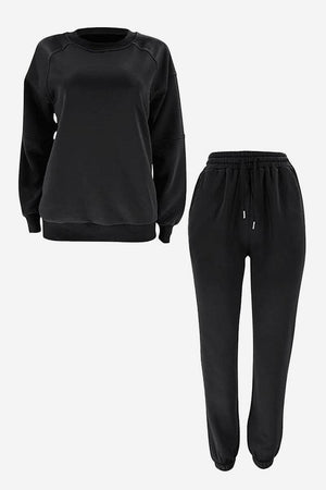 Black comfy chic tracksuit set with relaxed fit sweatshirt and elastic waist jogger pants
