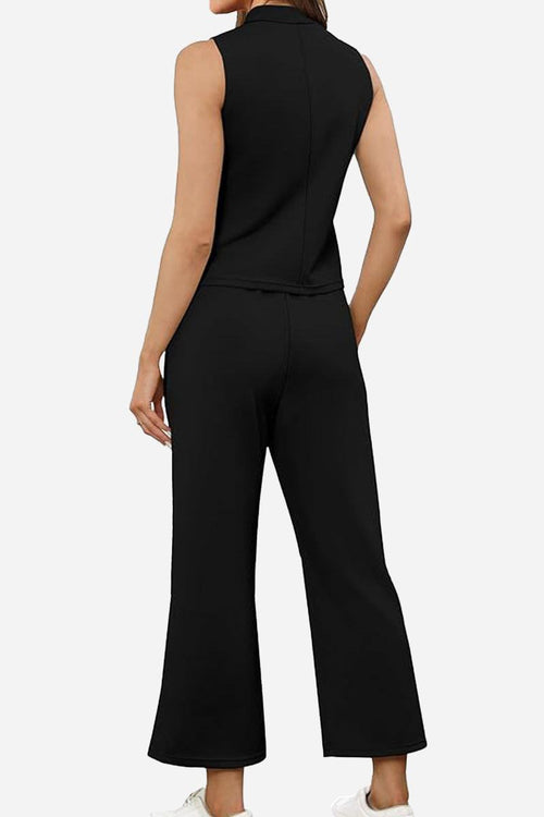 Back view of black Cotton Chic Sleeveless two-piece outfit with sleeveless top and wide-leg pants
