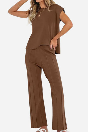 First Class Travel comfort brown two-piece set with pleated pants and sleeveless top for wrinkle-resistant, versatile travel wear