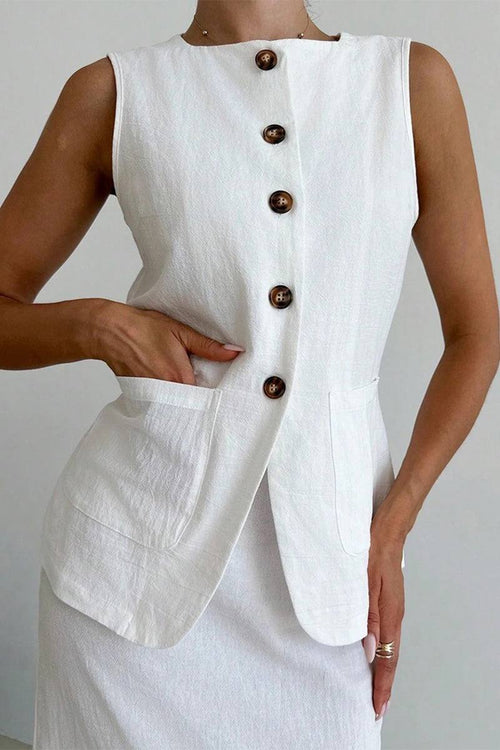 White sleeveless cotton-linen blend vest with buttons and front pockets, paired with matching high-waisted skirt.