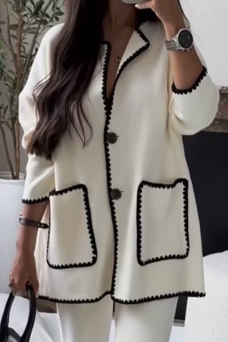 White contrast-trim knit cardigan with black edging and front pockets, stylish and comfortable knitwear set