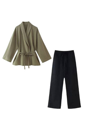 Mix-Match Lounge-to-Travel Set with olive wrap top and black wide-leg pants for stylish comfort.