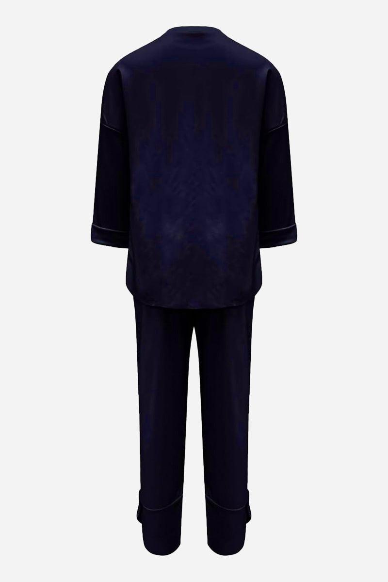 Back view of MILANO Comfort & Confidence navy two-piece set with sweatshirt and jogger pants in wrinkle-resistant polyester.