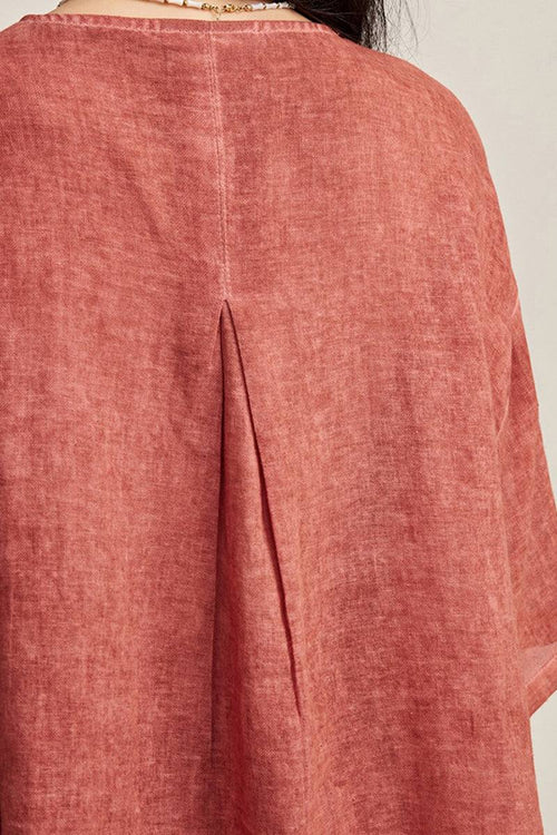 Close-up of back detail on 100% linen stone-washed sunset breezy set top in muted red color