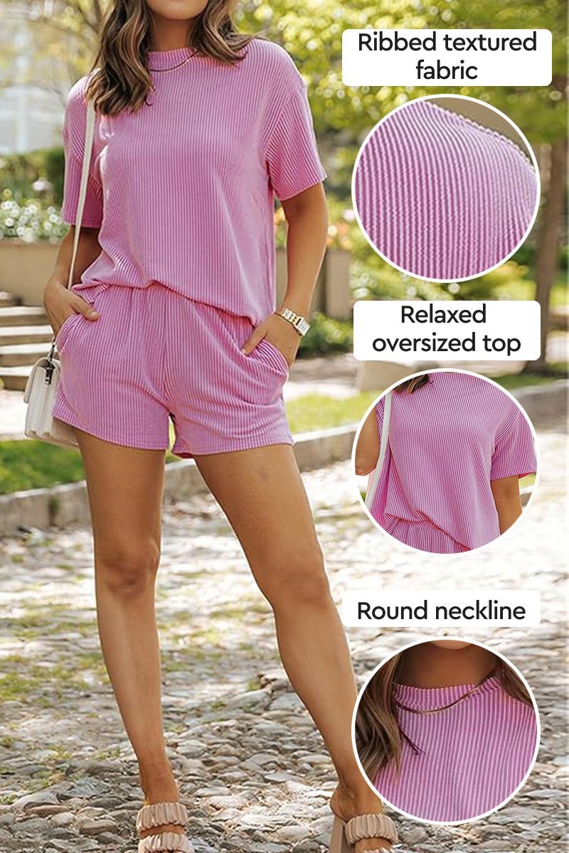 Woman wearing pink ribbed textured relaxed oversized top and shorts set for slow mornings outdoors in casual setting