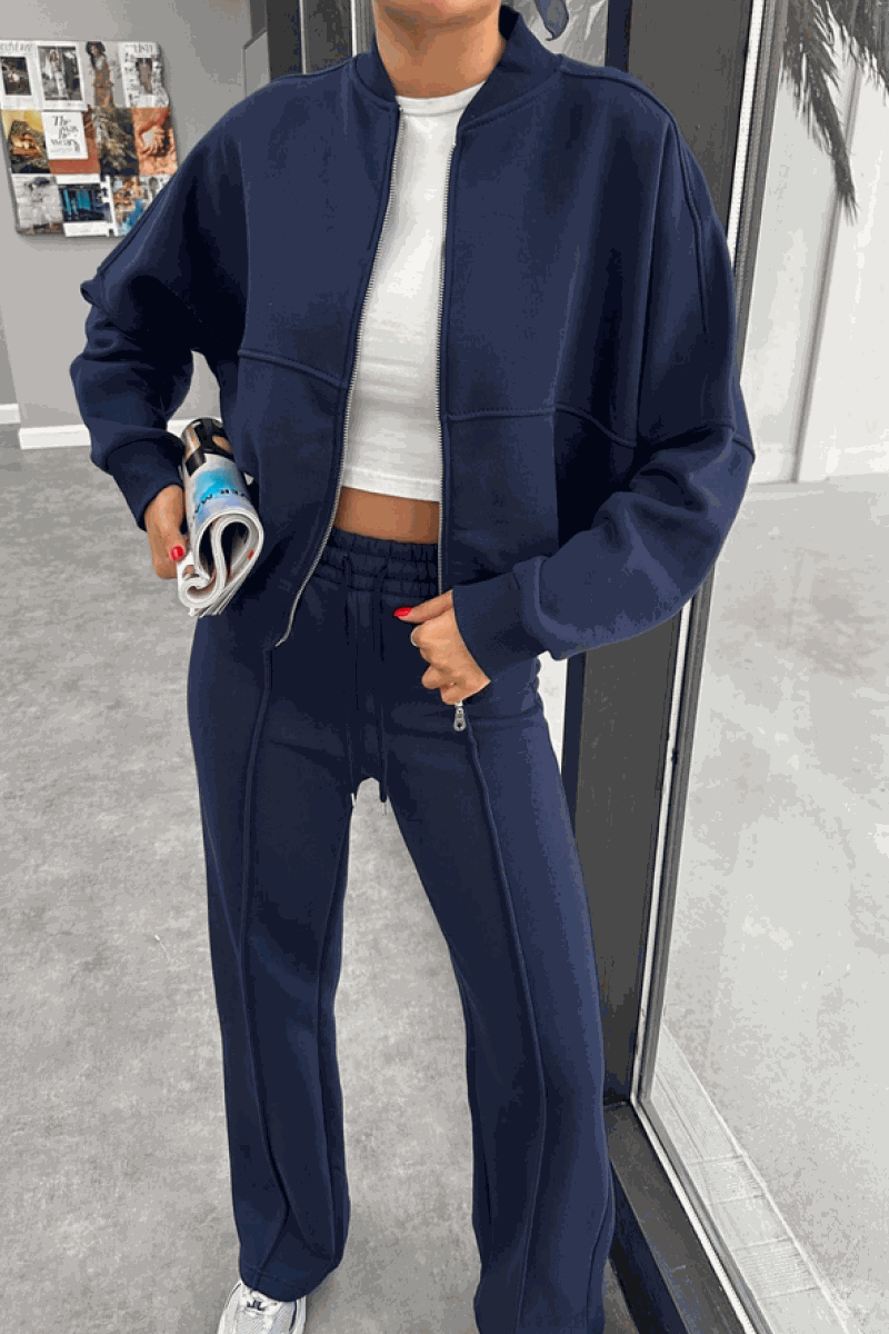 The Voyager Zip Set navy zip-front sweatshirt and wide-leg joggers travel outfit