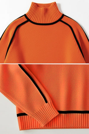 Orange Zero Itch Turtleneck Sweater with black contrast trim and soft, smooth knit fabric