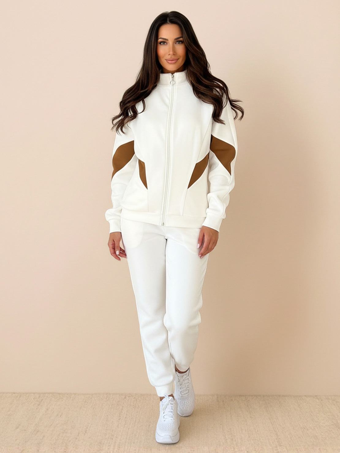 Woman wearing colorblock comfort tracksuit with contrast curved panels and relaxed fit