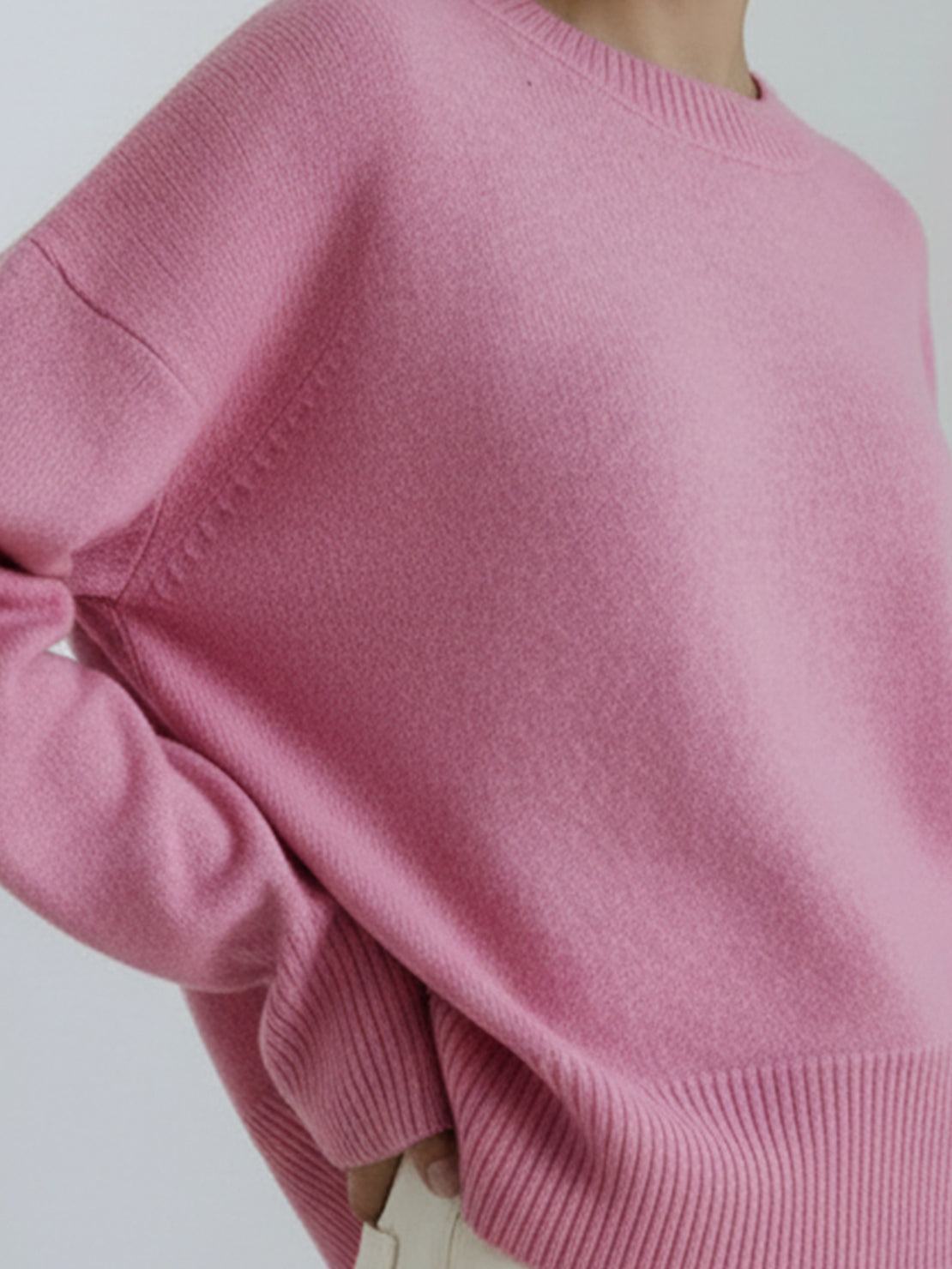 oversized crew neck knit sweater with drop-shoulder sleeves and ribbed cuffs in neutral color