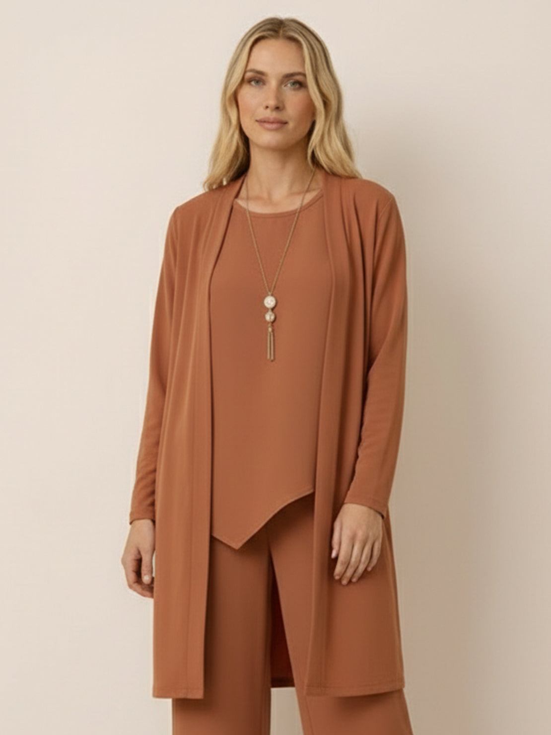 Women wearing open-front three-piece co-ord with longline cardigan, round-neck tank, and wide-leg trousers
