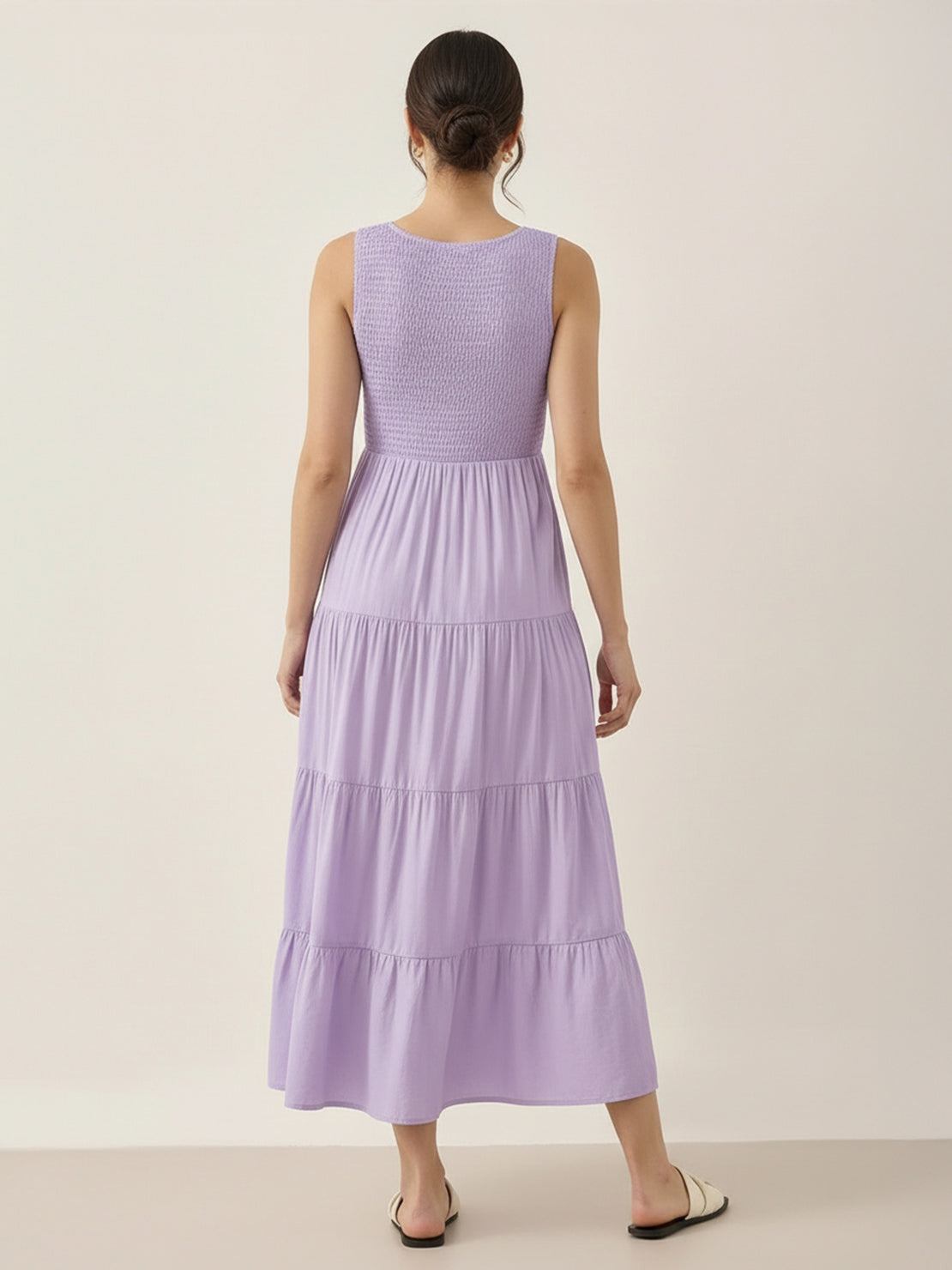 Smocked sleeveless maxi dress with tiered skirt and scoop neckline in lightweight breathable fabric