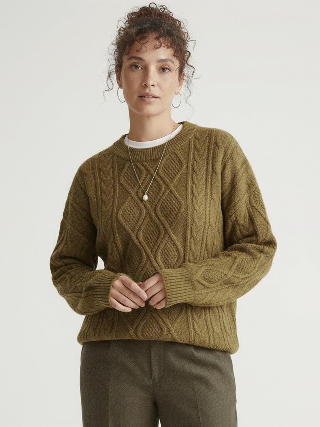 Oversized cable-knit crewneck sweater with dropped shoulders and ribbed trim