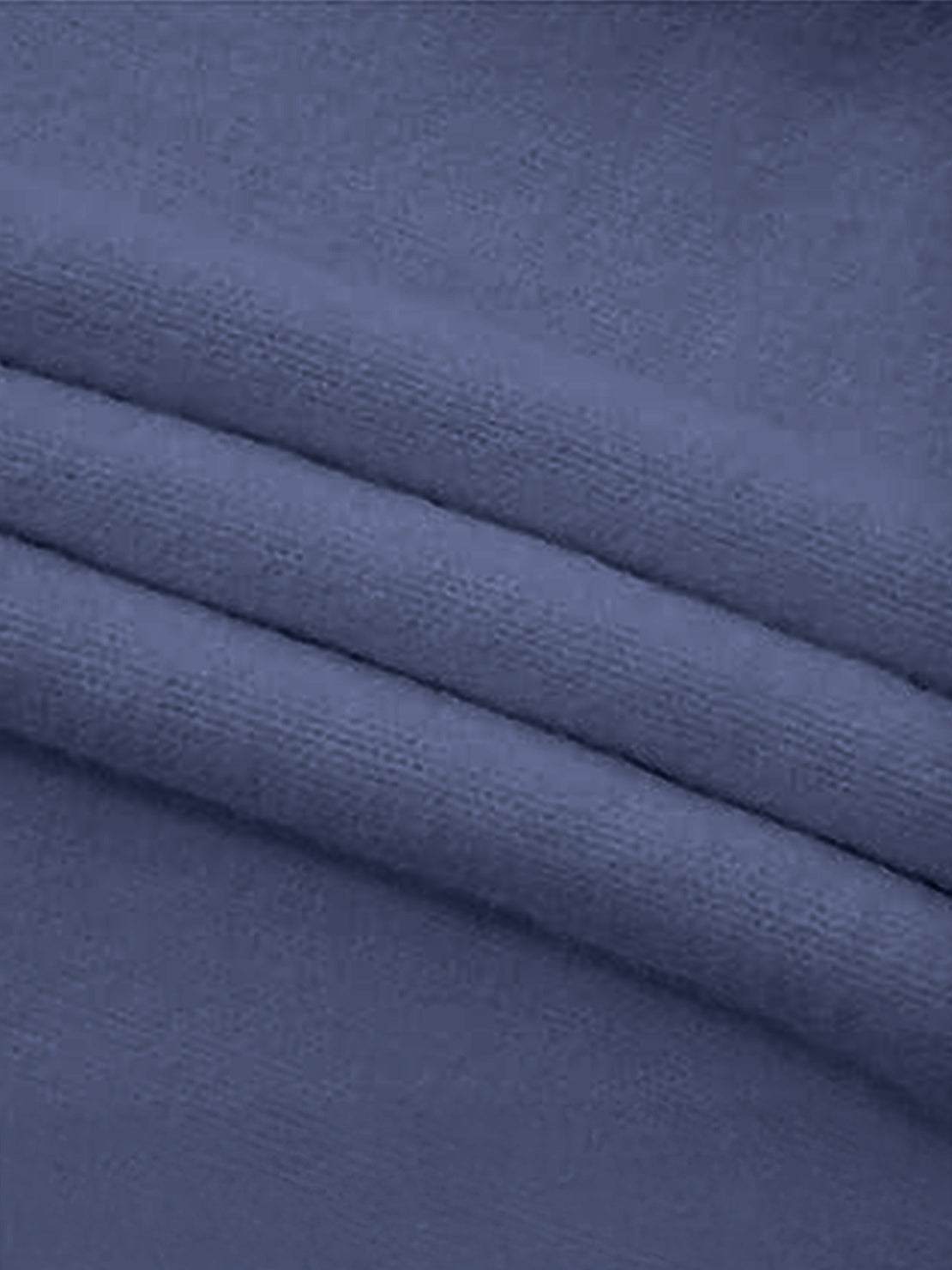 Oversized cable-knit crewneck sweater with dropped shoulders and ribbed trim