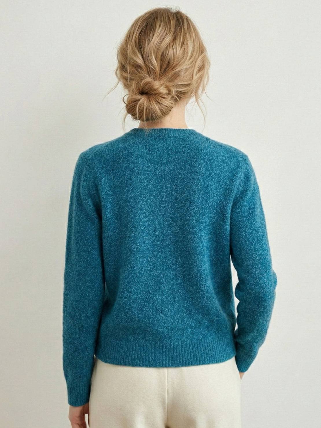 Chunky marled knit merino wool cardigan with button front and ribbed cuffs for a relaxed fit