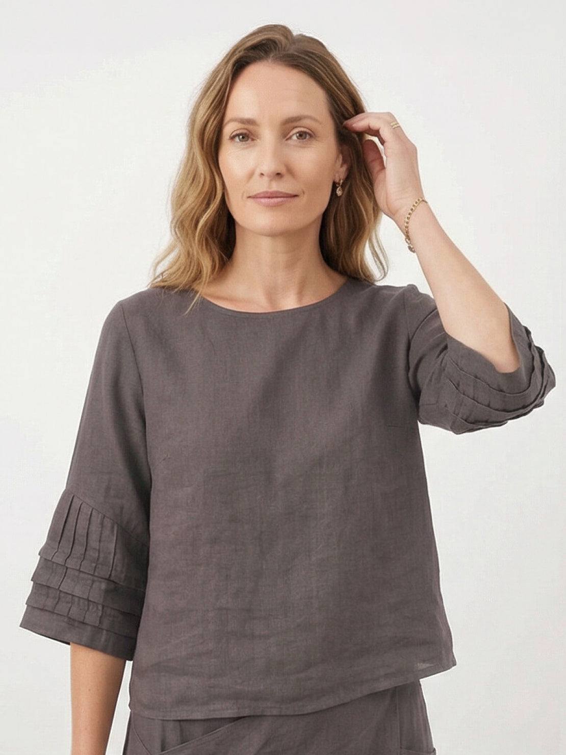 Two-piece 100% cotton wrap-front skirt and hip-length top set with crinkle finish and elastic waistband