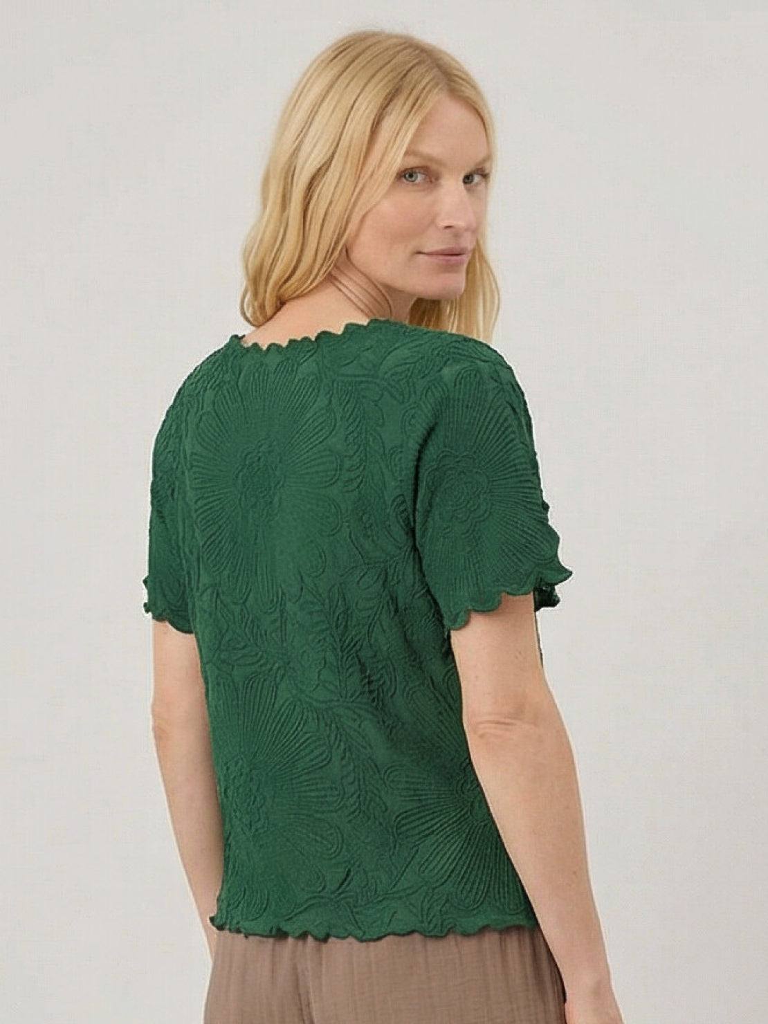 Floral jacquard pleated top with 3D floral texture, flutter sleeves, and relaxed A-line silhouette