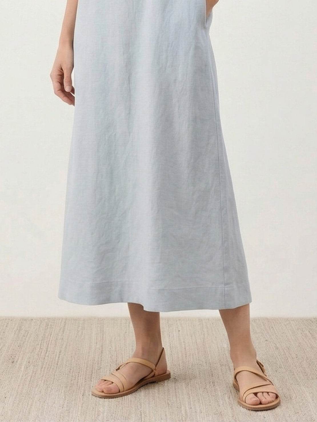 Lightweight 100% cotton linen sleeveless maxi dress with round neckline and flowing ankle-length silhouette