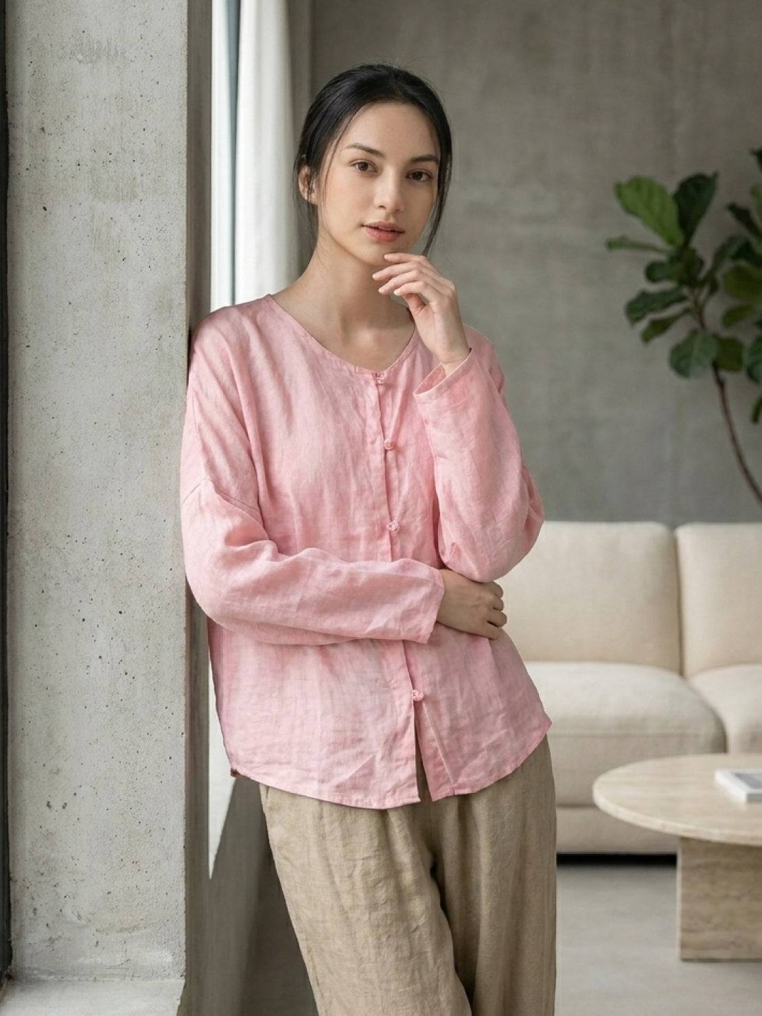 Oversized 100% linen frog-button blouse with collarless neckline and curved hem