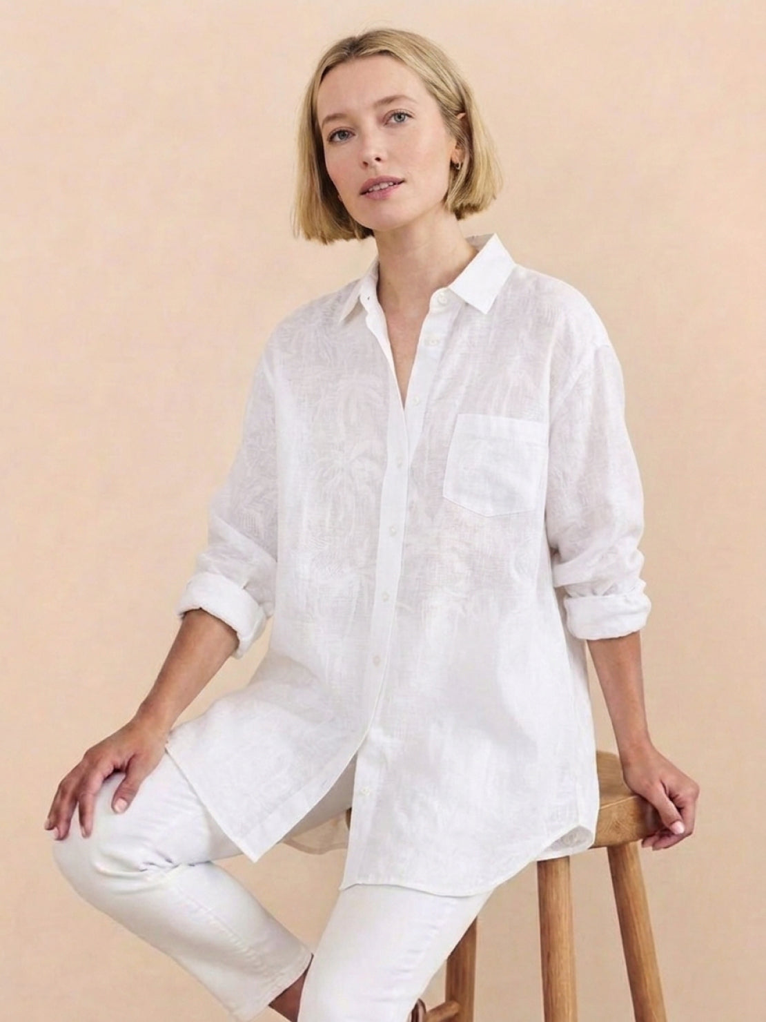 relaxed oversized linen shirt with back pleat and button-up design