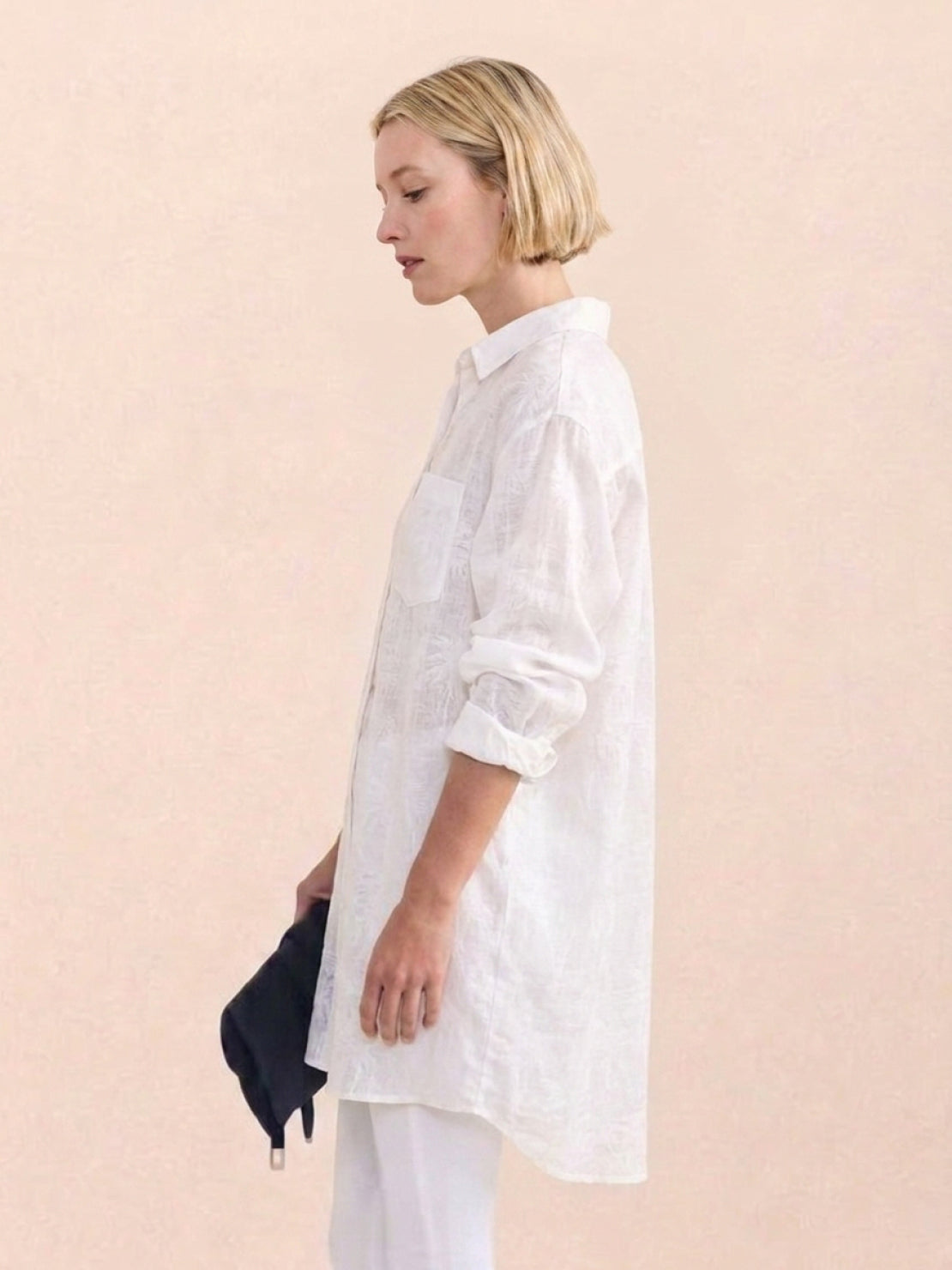 Relaxed oversized linen shirt with back-pleat detail and button cuffs
