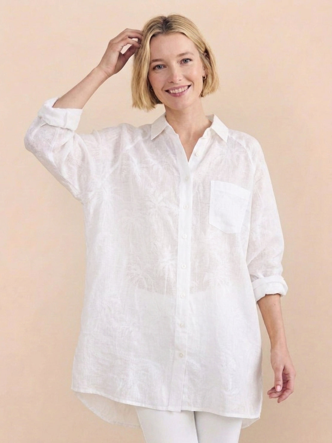 Relaxed oversized linen shirt with dropped shoulders and back-pleat button detail in cotton fabric