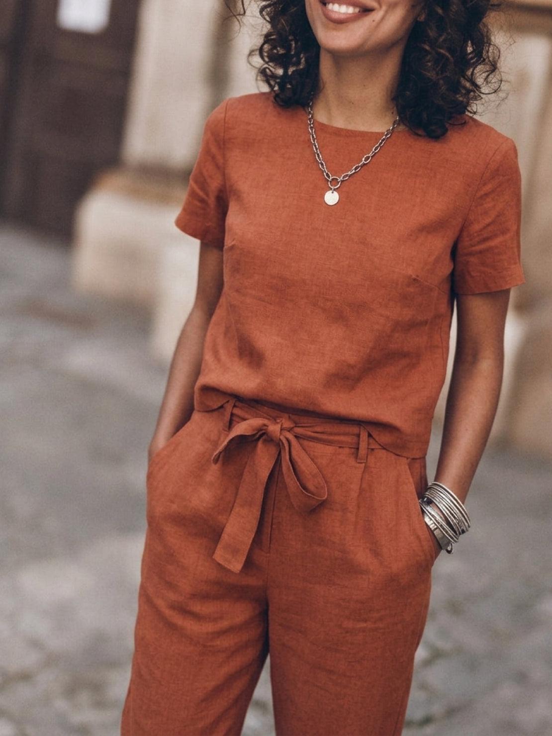 Cotton-linen set with relaxed short-sleeve top and straight-leg pants in a breathable, monochrome cotton-linen blend.