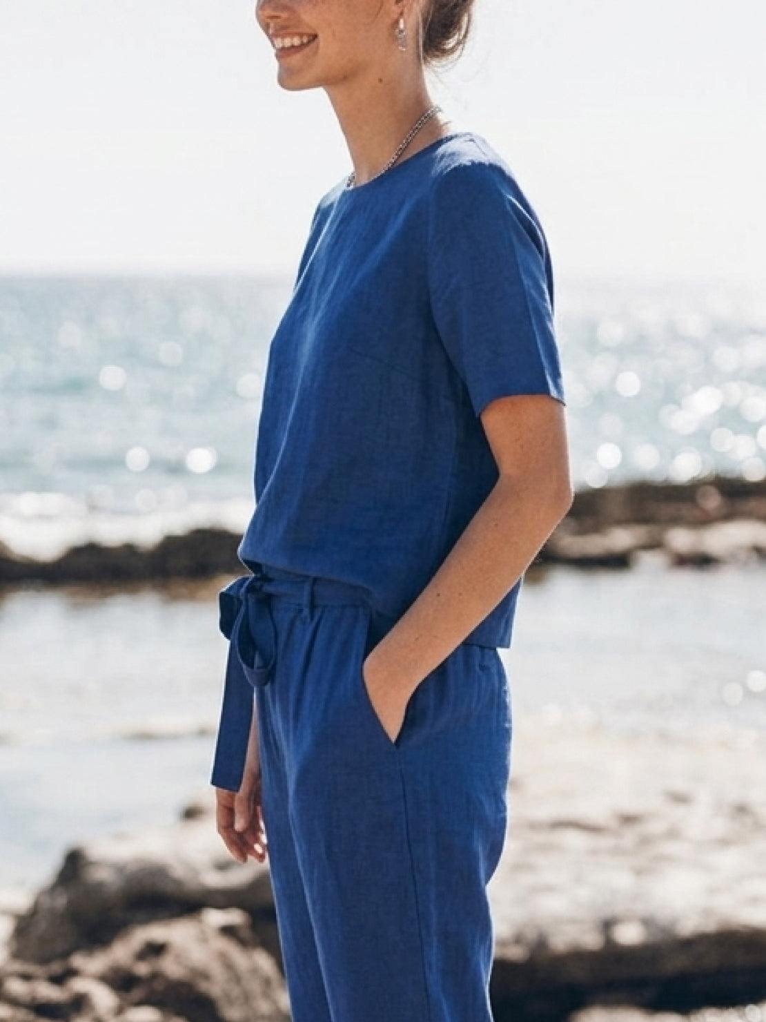 woman wearing relaxed fit cotton-linen set with short sleeve top and straight-leg pants in monochrome tones