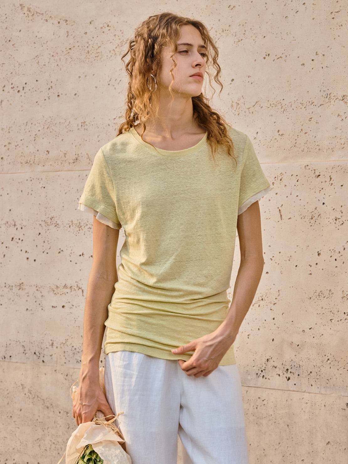 100% linen tee with rolled cuff sleeves and relaxed scoop neckline