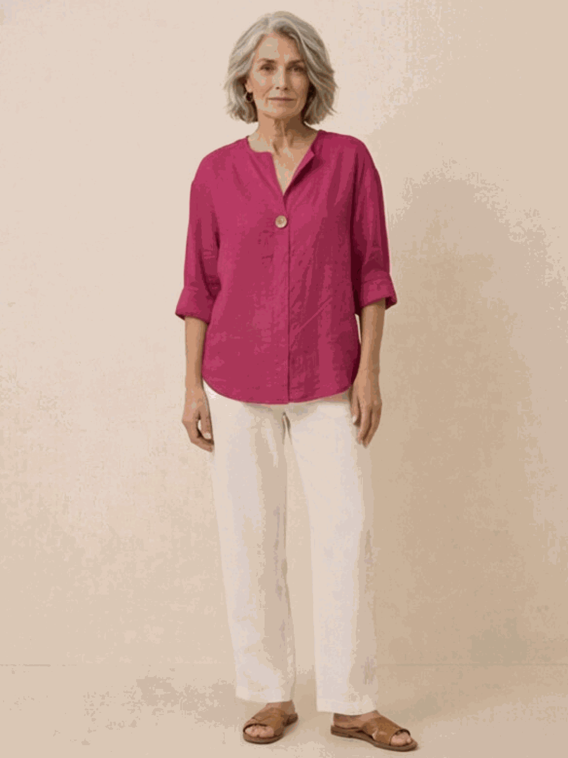 white pure linen age-defying shirt with button details on wooden hanger
