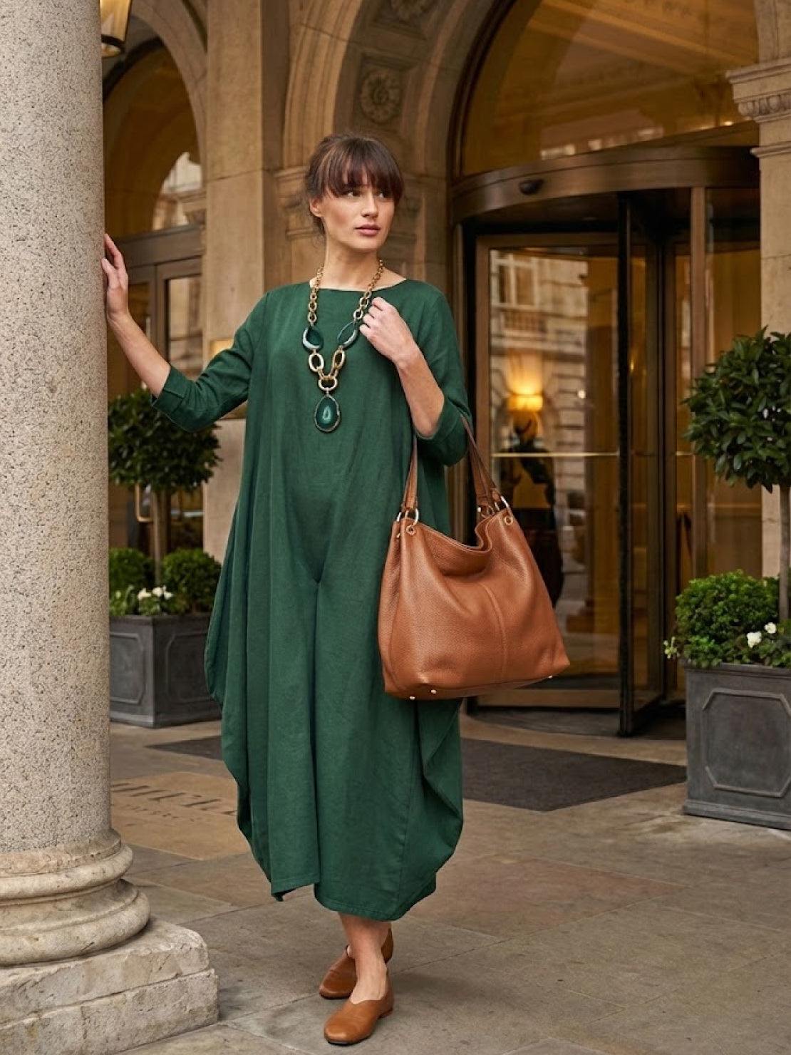 Bohemian maxi dress in loose fit linen blend with long sleeves and floor length design