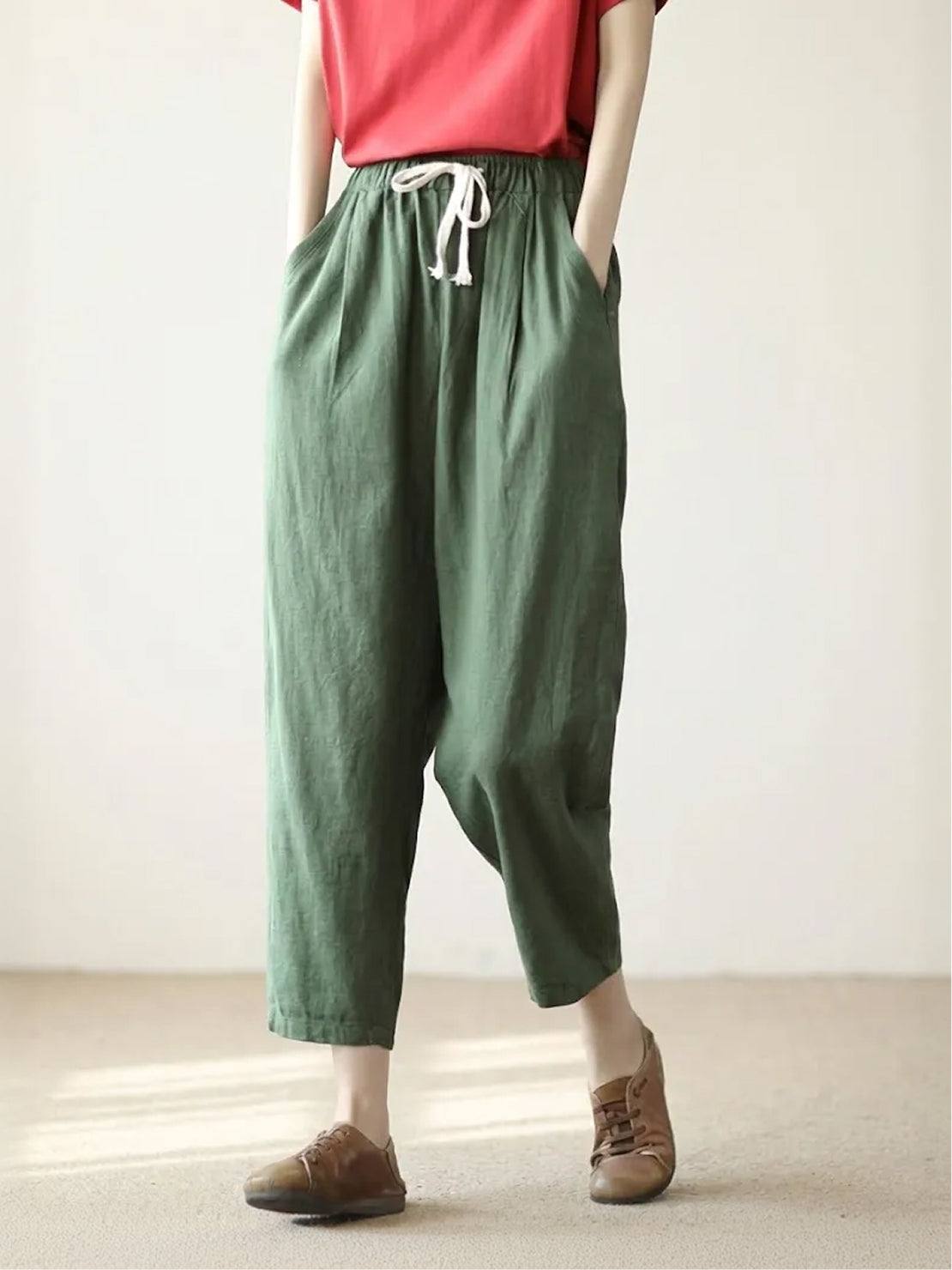 Woman wearing breezy relaxed fit straight pants in various colors, showcasing comfort and style