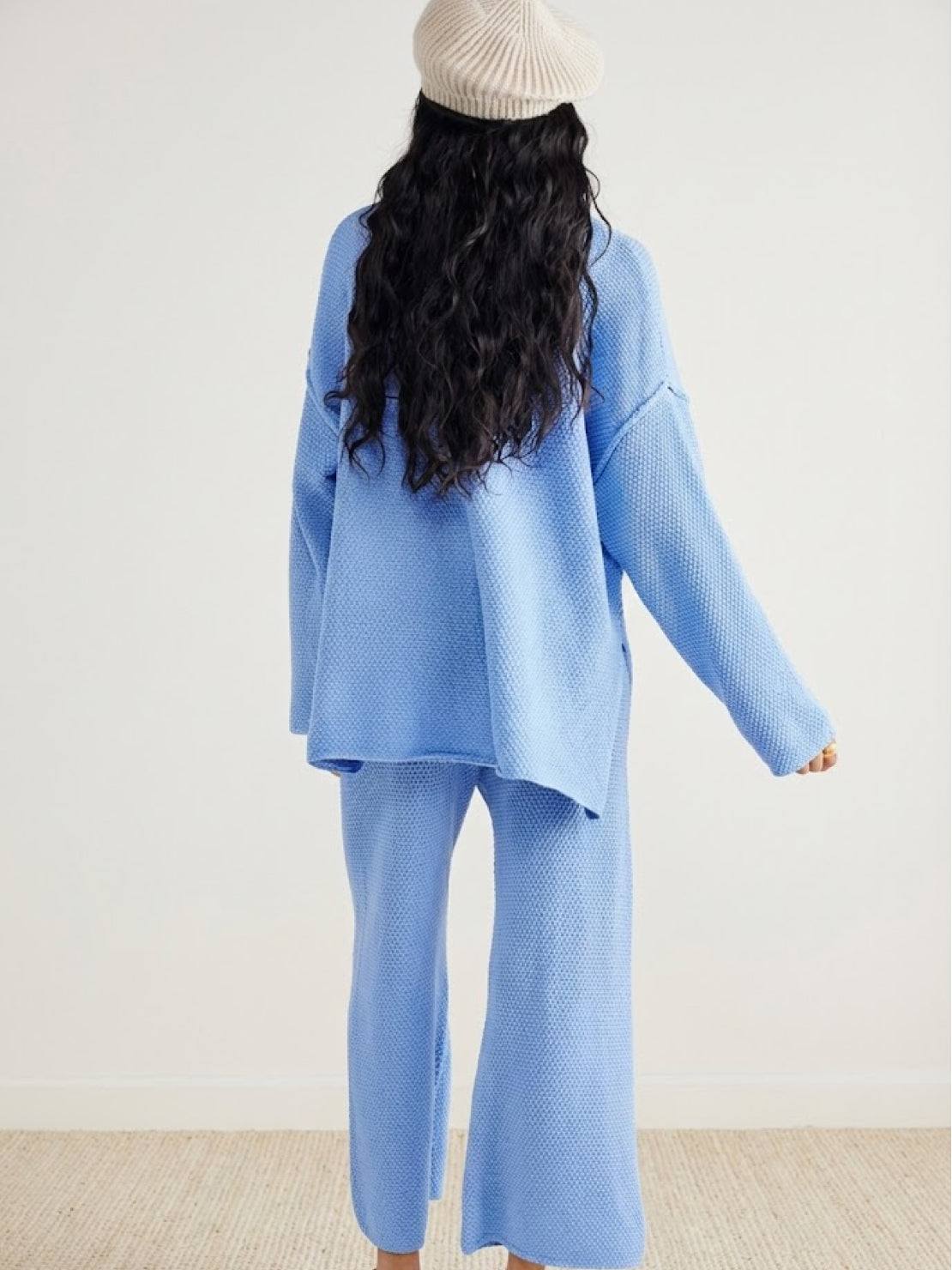 Two-piece oversized set showcasing multi-weather comfort with lightweight, wrinkle-resistant fabric and relaxed fit design