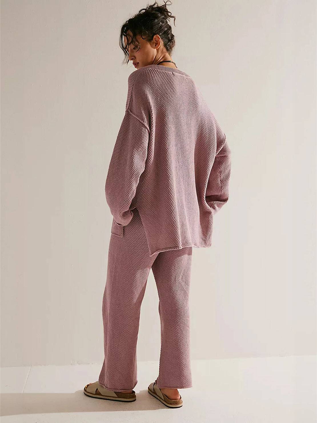 woman wearing multi-weather comfort two-piece oversized set with cropped wide pants and long sleeves outdoors