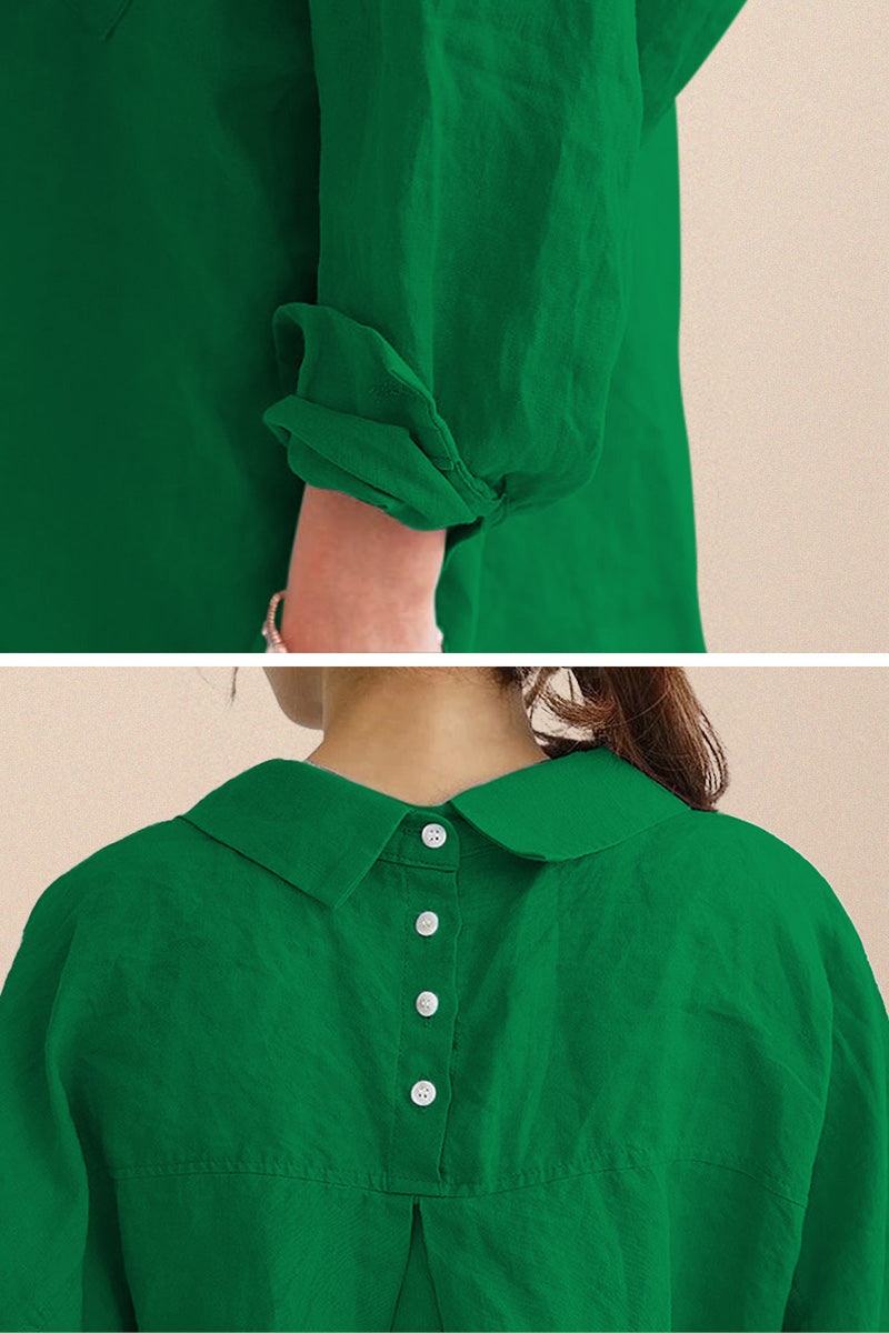 Green oversized linen shirt with rolled sleeves and back button detailing