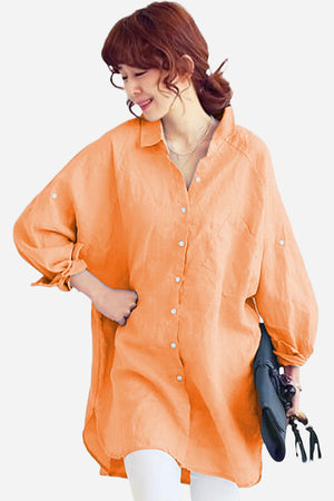 Oversized linen shirt in sun-washed pink with relaxed fit and button details