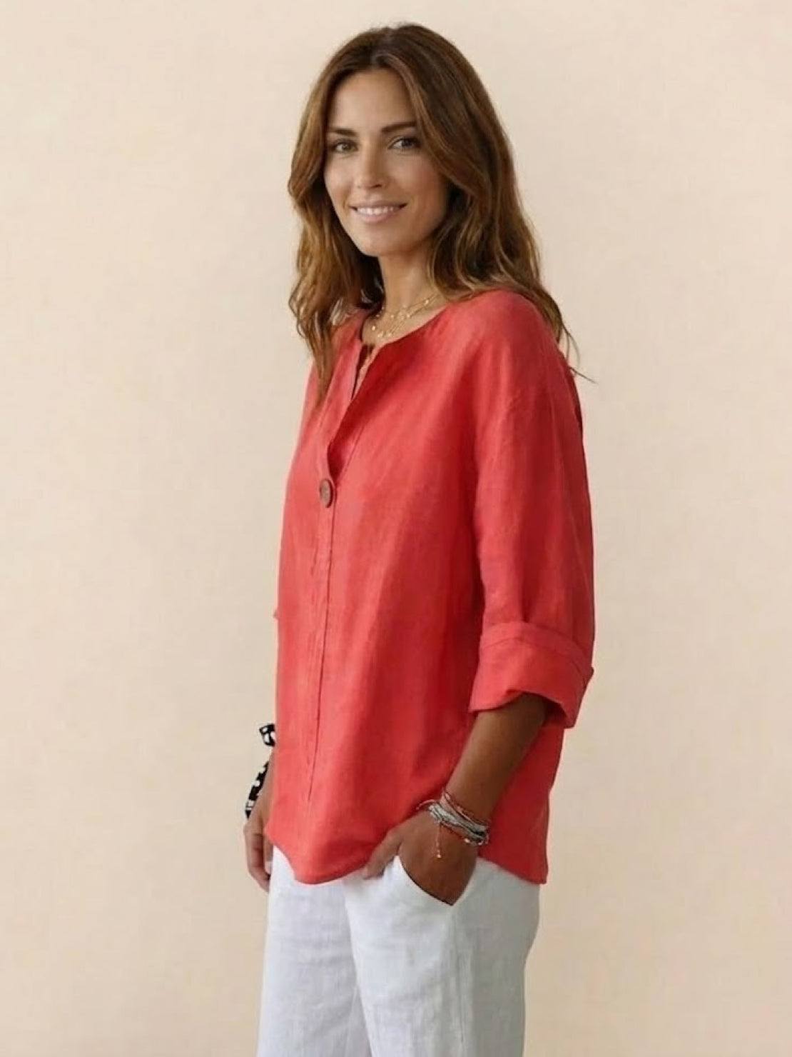 white pure linen age-defying shirt with button detail on hanger