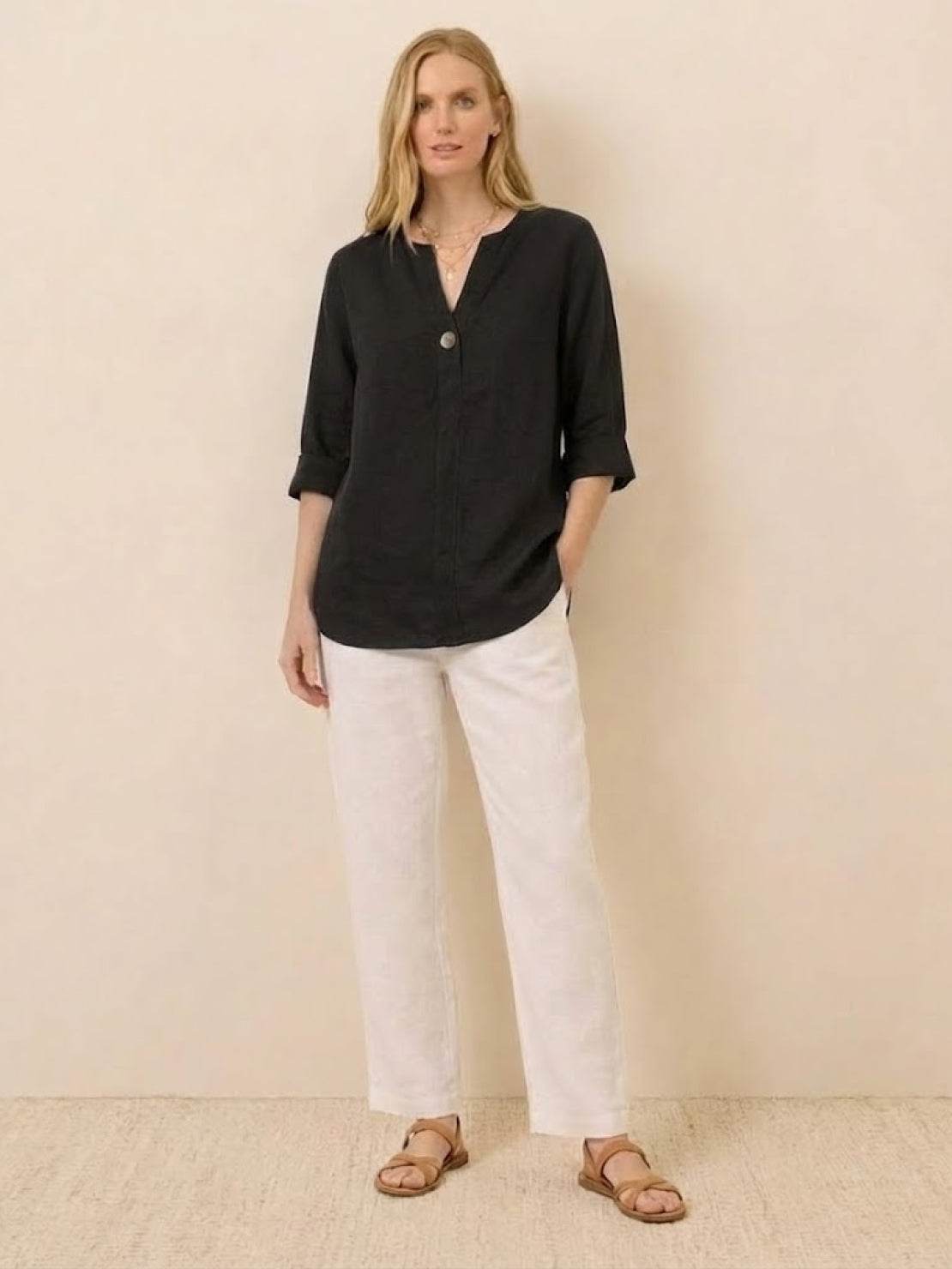 Pure Linen Age-Defying Shirt with elegant button details and breathable fabric for comfortable, stylish wear.