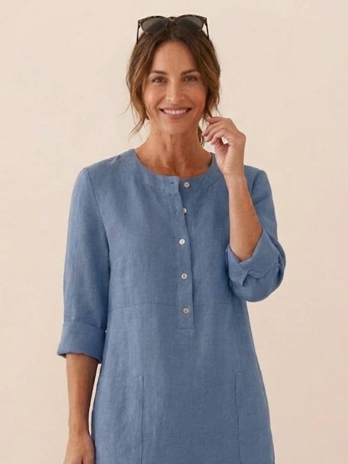 Blue lightweight cotton dress with rolled 3/4 sleeves and button front, perfect for summer and casual wear