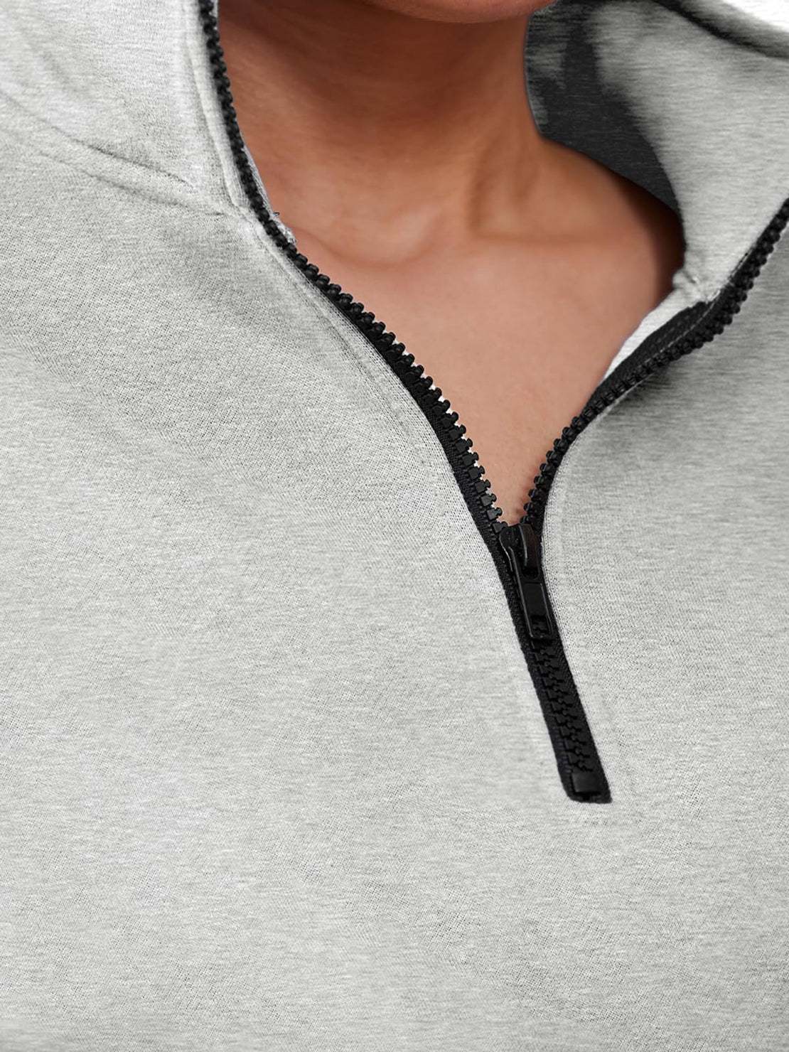 Close-up of grey ultra-soft and comfy co-ord tracksuit set with black zipper detail