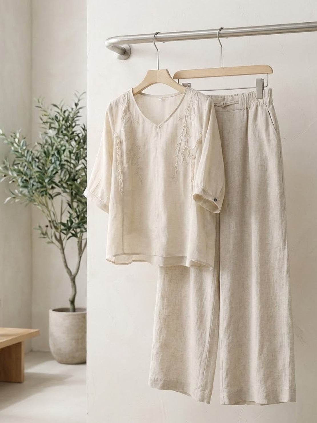 Women's golden hour set with embroidered V-neck top and high-waisted wide-leg trousers in breathable cotton linen blend