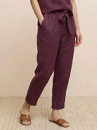 woman wearing relaxed cotton linen set with monochrome short-sleeve top and straight-leg pants
