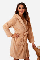 Woman wearing beige premium comfort nightgown bathrobe with hood and belt
