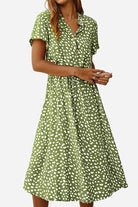Green casual bohemian dress skirt with white dot print, short sleeves, and button-up front